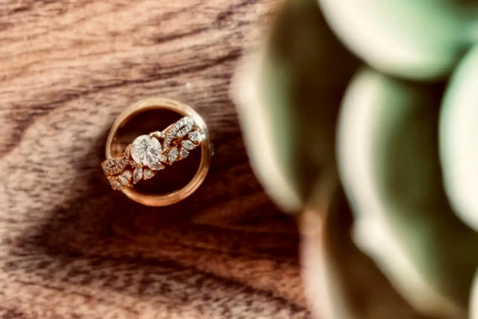An infinity ring on a wooden table
