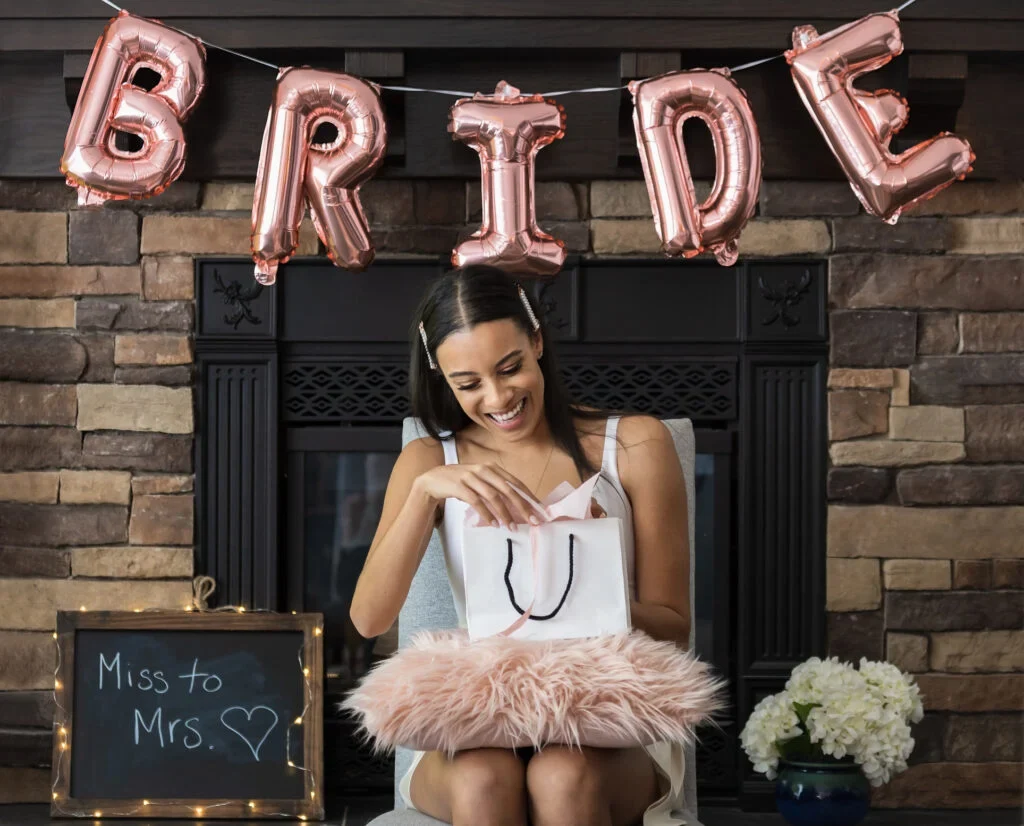 A bride-to-be looking excited at her bridal shower
