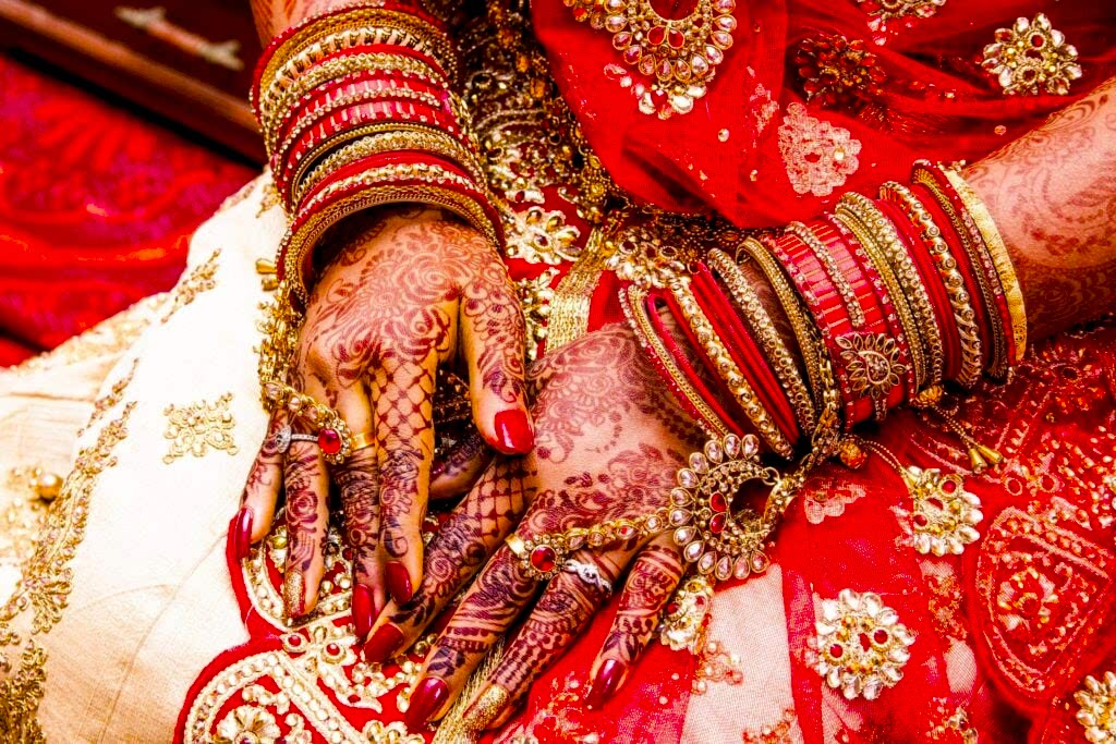 An Indian bride wear traditional henna tattoos after a Mehendi ceremony 