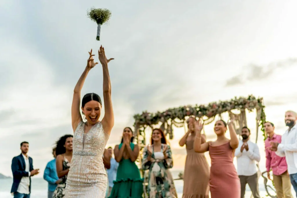 A bride throws the bouquet